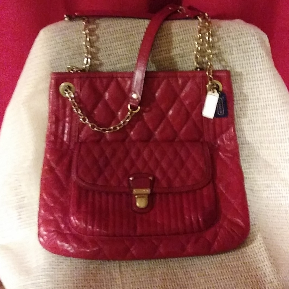 Red leather coach bah